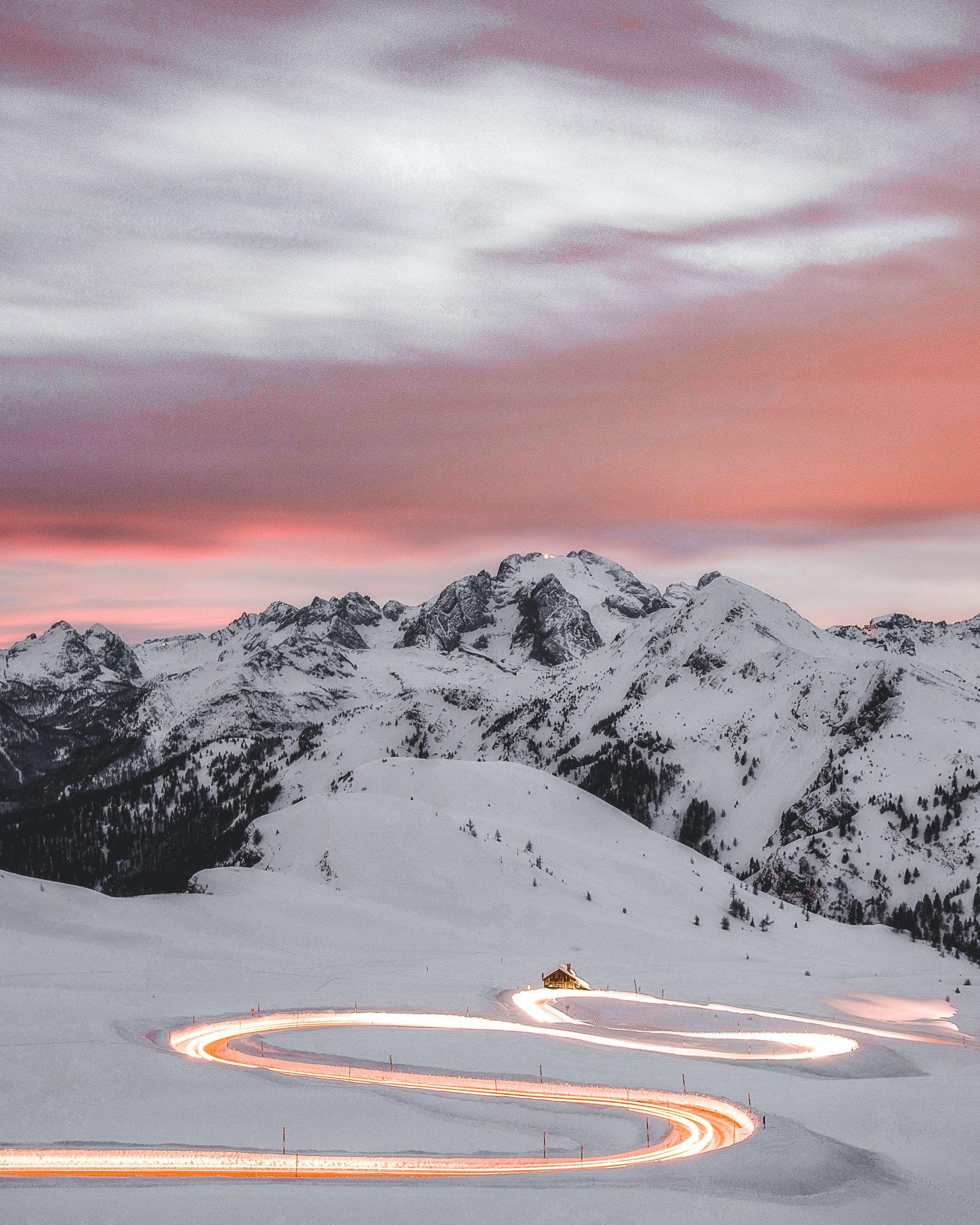 time-lapse-photography-of-curved-road-with-vehicles-passing-2437299